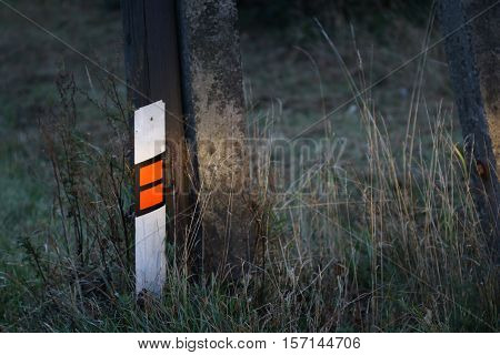 Reflective delineator column in the spotlight - safe transport