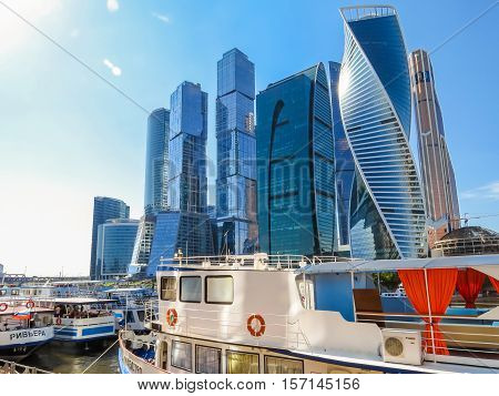 MOSCOW, RUSSIA - JULY 17, 2016: Moscow skyline. Modern skyscrapers in business district and river ships on the Moscow River