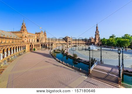The Plaza de Espania is a Square located in the Park in Seville Built in 1928 for the Ibero-American Exposition of 1929. It is a landmark example of the Renaissance Revival style