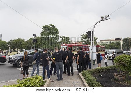 BANGKOK THAILAND - OCT 19 : crowd of people at Ratchadamnoen Road near Sanam Luang while the funeral of king Bhumibol Adulyadej in Grand Palace on october 19 2016