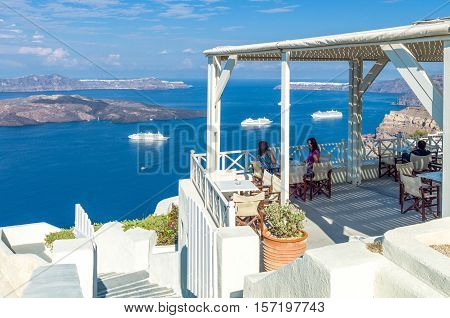 Santorini Greece - October 13 2012: Tourists in a wine house near Pirgos village