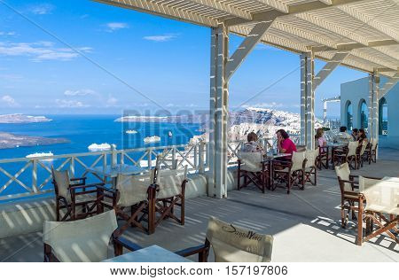 Santorini Greece - October 13 2012: Tourists in a wine house near Pirgos village