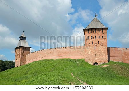 Two towers of the Kremlin of Veliky Novgorod in the July afternoon. Russia