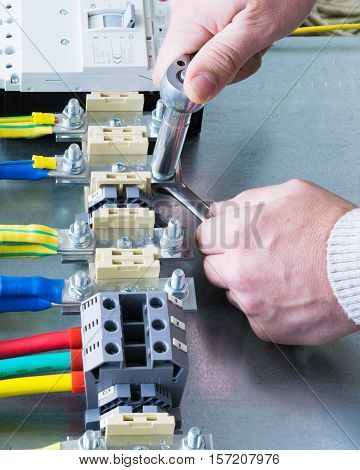 mounting electrical components on the circuit Board in the electrical Cabinet