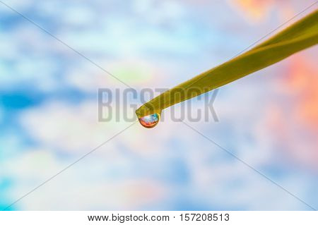 Reflection of the sky in a drop of water