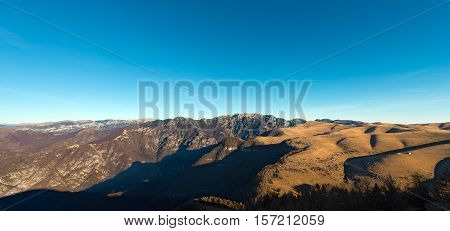 Plateau of Lessinia Regional Natural Park of Lessinia Veneto Verona Italy. In the background the Italian Alps (Carega)