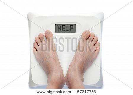Feet On Bathroom Scale Isolated On White