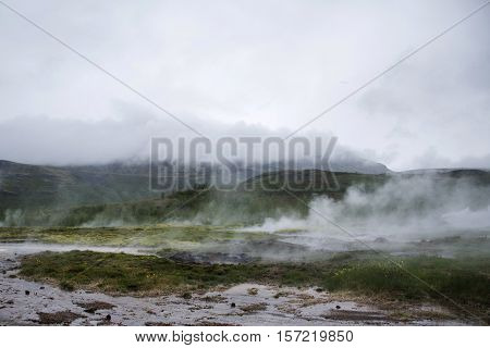 The Great Geysir Strokkur in Iceland hot fog geology