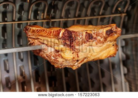 Pork ribs cut on electric grill
