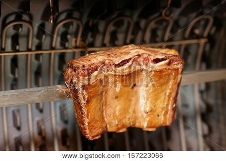 Pork ribs cut on old style electric grill