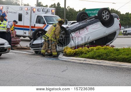 Orlando Florida - September 15th 2009: Vehicle rollover accident at major intersection in Orlando Florida September 15th 2009