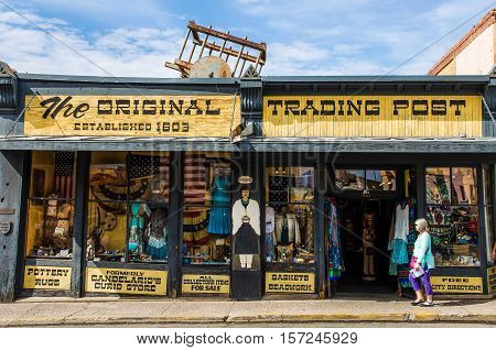 Santa Fe, USA - July 30, 2015: The original trading post antique building storefront selling Native American goods in downtown