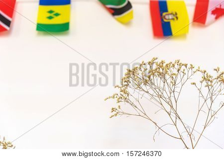 Flowers White And Flag; On The Grey Background