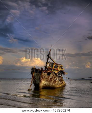 Abandoned fishing ship at Kuala Penyu, Sabah