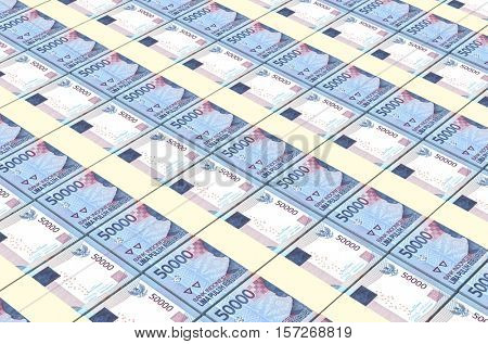 Indonesian rupiah bills stacks background. 3D illustration.