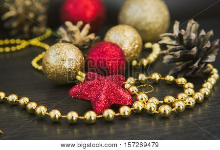 red and gold Christmas toys star and cones