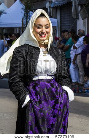 SELARGIUS, ITALY - September 11, 2016: Former marriage Selargino - Sardinia - portrait of a beautiful girl in traditional Sardinian costume