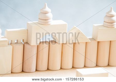 noname wooden bulding blocks, building castles and houses from wooden blocks at home
