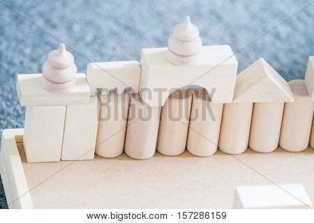 noname wooden bulding blocks, building castles and houses from wooden blocks at home