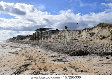 VILANO BEACH, FLORIDA, USA - NOVEMBER 6, 2016: Aftermath of beach erosion caused by hurricane Matthew hitting the east coast of Florida on October 7, 2016