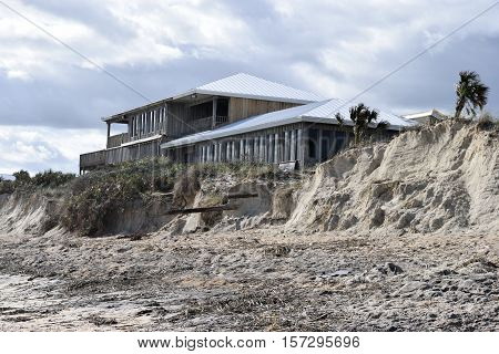 VILANO BEACH, FLORIDA, USA - NOVEMBER 6, 2016: Aftermath of beach erosion caused by hurricane Matthew hitting along the east coast  of Florida on October 7, 2016.