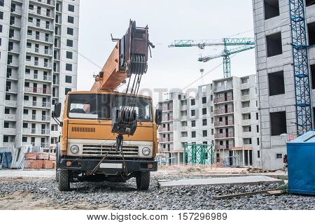 Mobile truck-mounted crane operating at construction site