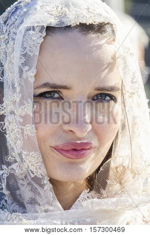 CAGLIARI, ITALY - October 29, 2016: Invitas waterfront Porto Sardinia performances of traditions and food. - Portrait of a beautiful woman of the free association of Dolianova