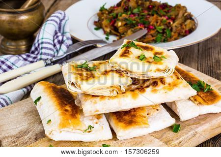 Grilled pita bread with mozzarella chees.Studio Photo