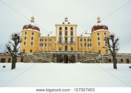 Moritzburg Castle in winter under snow cover