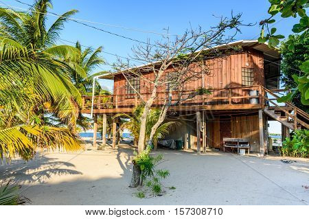 Wooden house on Caribbean beach in Belize, Central America