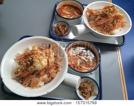 2 lunch sets of stir fry garlic pepper prawn with mushroom Tomyum soup