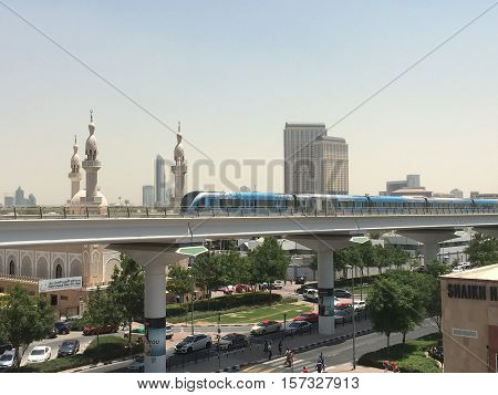 DUBAI, UAE - AUG 26: Train approaching Oud Metha Metro Station in Dubai, UAE, on Aug 26, 2016. Guinness World Records declared it the worlds longest fully automated driverless metro network.