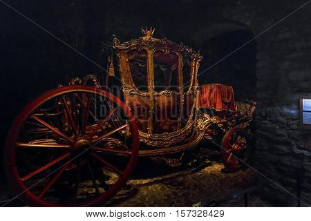 STOCKHOLM, SWEDEN - JUNE 28, 2016: This is royal coach in the hall of royal carriages of the Armory (Livrustkammaren) at the Royal Palace.