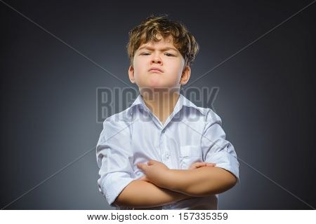 Closeup sad boy with worried stressed face expression.