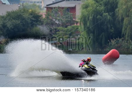 BUCHAREST ROMANIA -SEPTEMBER 23: Professional jet ski riders compete at the Palazz Jet Ski Championship 2016 at Fundeni lake in Bucharest on september 23 2016 in Bucharest Romania