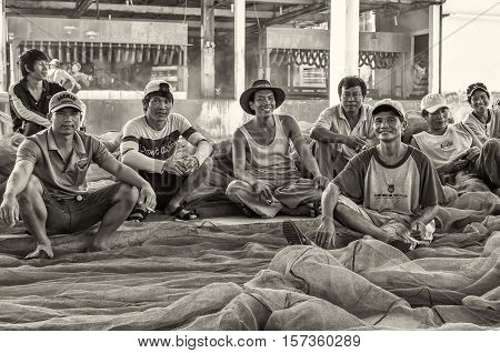 Vietnamese dockers in Nha-Trang. Vietnam, May of 2016