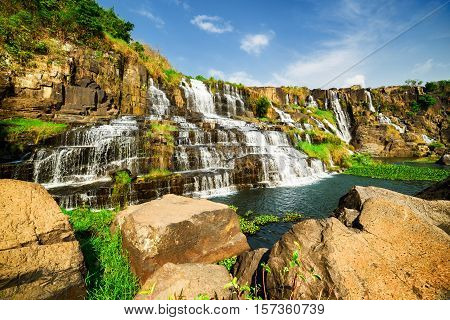 Beautiful View Of Natural Cascading Waterfall With Crystal Water