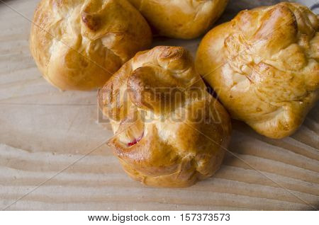Homemade sweet buns from dough. Pastry puff. Flour products. Sweet pastry catering fast food. Fattening meal. Dessert fresh baked snack. Baking cooking Yeast dough Pies production