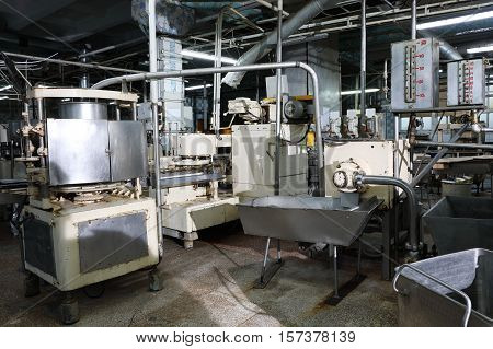 Outdated machine equipment of fish canning factory