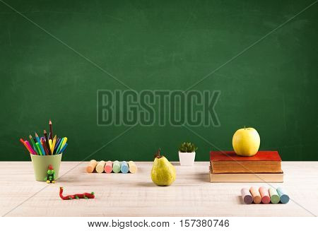 Back to school concepty with clear blackboard background, desk, items