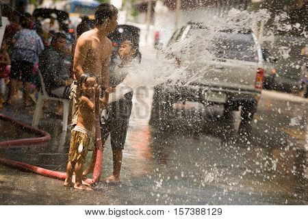Bangkok, Thailand - April 13, 2008 : 
During Songkran the Thai New Year's festival. Major streets are closed for traffic, and are used as arenas for water fights.