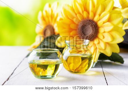 Sunflower oil on a white garden table.