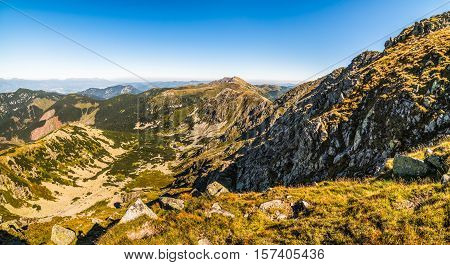 Valley and Mountain Landscape. Under Chopok Mount with Rocks in Foreground and Dumbier Mount in Background. Low Tatras Slovakia.
