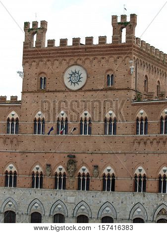 Siena - Gothic Palazzo Pubblico facade. tuscany, Italy