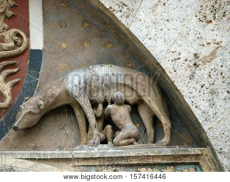 Siena - the town's emblem; a she-wolf suckling the infants Romulus and Remus.