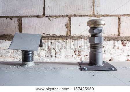 in a separate room in a old building there is a heating oil tank