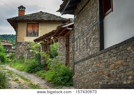 Summer time along the streets of the village of Kovachevitsa, Bulgaria