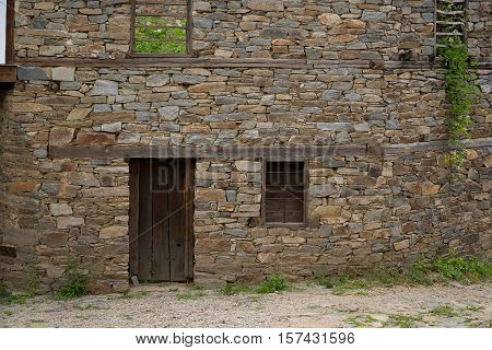 Windows and door in one old Bulgarian house at the village of  Kovachevitsa, Bulgaria