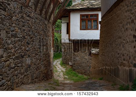 Summer time along the streets of the village of Kovachevitsa, Bulgaria