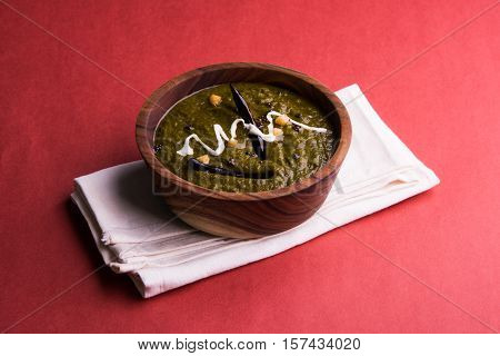 corn flour flat bread or roti or Makki Ki Roti with sarso da Saag or mustard leaves curry, Indian Food popular in winter season in north india